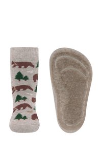 Skarpety beżowe do kolan z wzorem przedstawiającym brunatnego misia i zielone drzewo; miękka tekstura z wyściełaną, antypoślizgową podeszwą dla lepszej przyczepności.