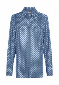 Sininen napitettava paita pitkillä hihoilla, jossa on valkoinen timanttikuvio, punaisia yksityiskohtia ja klassinen kaulustyyli. Sujuva tekstuuri.