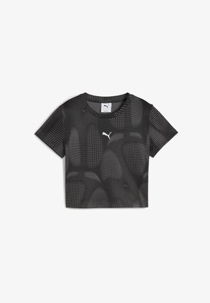 Zwart cropped t-shirt met een stippenpatroon en een klein wit Puma-logo op de voorkant, met korte mouwen en een ronde halslijn.