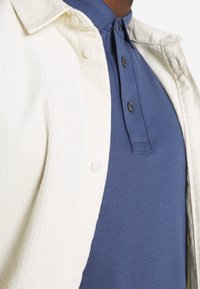 Tommy Hilfiger Polotričko - light blue