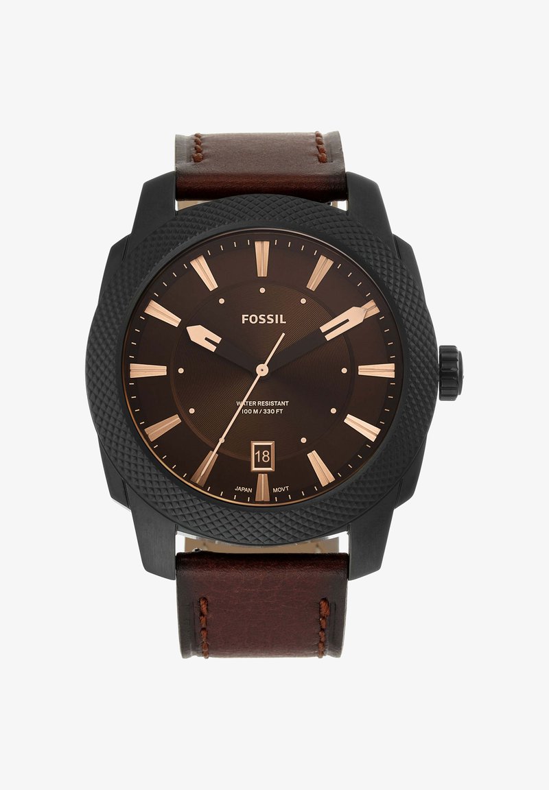 Herrenuhr von Fossil mit schwarzer, strukturierter Lünette, braunem Zifferblatt, goldfarbenen Markierungen, Datumsfenster bei 6 Uhr und braunem Lederarmband, Anzeige 9:10:35.