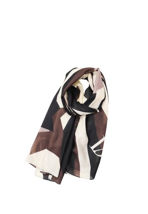 Pañuelo de seda con grandes formas geométricas en negro, marrón, beige y crema, plegado suelto sobre un fondo blanco.