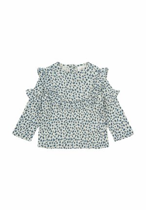 Balta bluzelė su mažomis tamsiai mėlynomis gėlių motyvais, atvira pečių dizainas, papuošimai su volanais palei pečius ir krūtinę, ilgos rankovės.