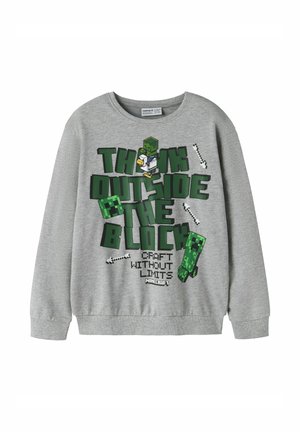 Sweat-shirt gris à manches longues Minecraft avec des lettres en blocs verts, des personnages pixelisés et du texte "Think Outside the Block, Craft Without Limits."