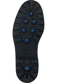 Suela de zapato de goma negra con un patrón de textura y ventilaciones circulares azules. El logo "GEOX" y "PATENTE ITALIANA" están grabados.