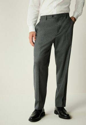 Gray wool trousers with a flat front, straight legs, and a smooth texture. Paired with black leather shoes, creating a polished look.