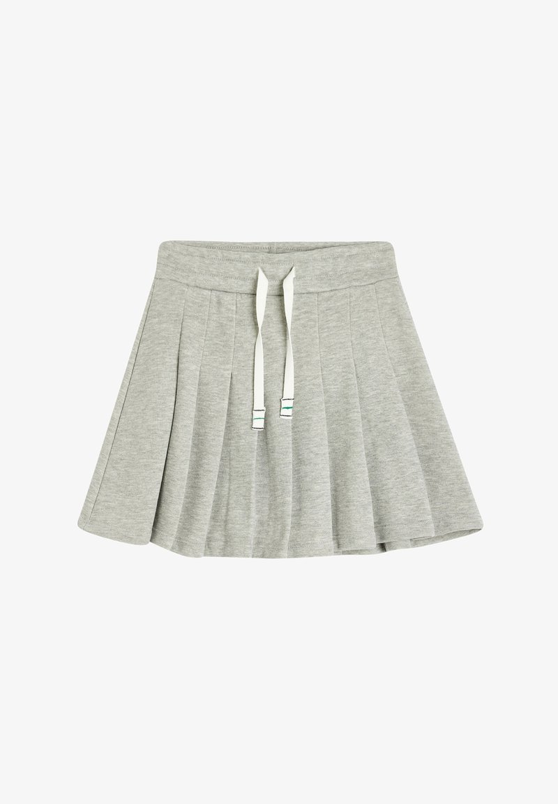 Gonna plissettata grigia realizzata in tessuto morbido, con una ampia vita elastica e lacci bianchi con cuciture verdi decorative.