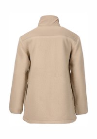 Beige fleecejakke med høj krave, struktureret stof og flade sømme. Har sidelommer og en ensfarvet overdel.
