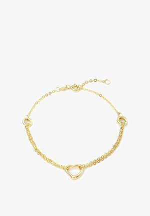 Pulsera en tono dorado que presenta un centro en forma de corazón, diseño de cadena enlazada y cierre ajustable. Textura suave con un acabado pulido.