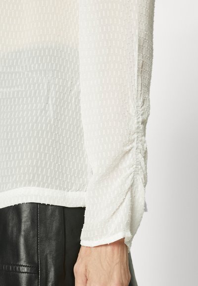 MUNTHE LUTJUMA - Skjortebluse - white