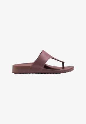 Mauve rubber flip-flop featuring a thong strap design and a textured sole with a slight heel. Open toe and side cutouts for airflow.
