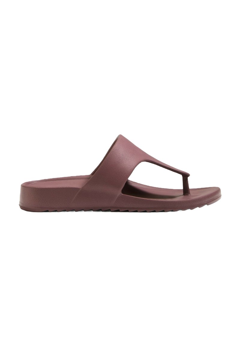 Flip-flop mauve din cauciuc, cu un design cu bretele între degete și o talpă texturată cu un toc ușor. Vârf deschis și decupaje laterale pentru ventilație.