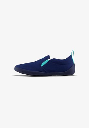 Navy slip-on shoe featuring a smooth textile upper, contrasting teal accents, and a flexible rubber sole with minimal tread pattern.