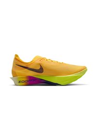 Zapatilla de running Nike de color amarillo brillante con el símbolo swoosh negro, suela ZoomX verde neón y detalle degradado en púrpura en la entresuela del talón.
