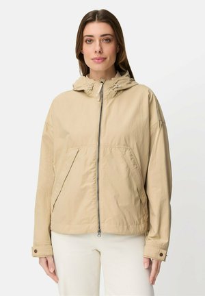 MIT - WEGE-REISSVERSCHLUSS - Regenjas - sand