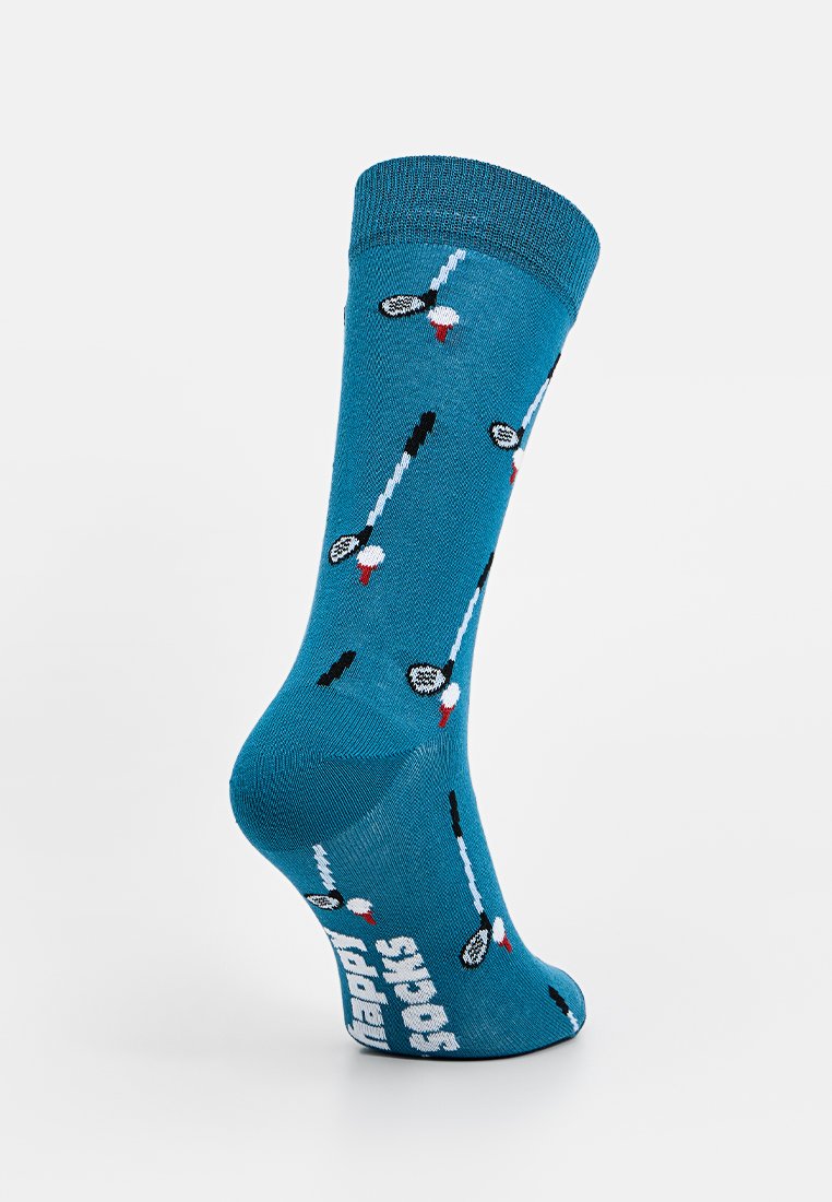 Türkise Baumwollsocke mit geripptem Bündchen, ausgestattet mit einem Muster von Badmintonschlägern und Federbällen. "Happy Socks"-Logo auf der Sohle in Weiß.