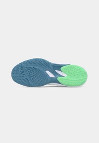 Shoe outsole featuring a textured design with a blue and green color scheme. Includes patterned grooves for enhanced traction and grip.
