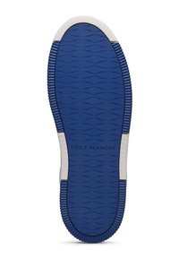 Soletta in gomma blu per sneaker con un motivo testurizzato ondulato. Accenti bianchi sul tallone e sui lati con "VOILE BLANCHE" impresso. Forma curvata.