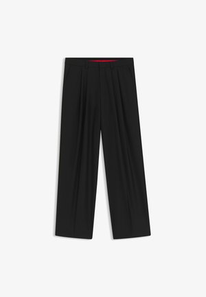 Schwarze weit geschnittene Hosen mit flachem Bund, zwei seitlichen Taschen, gefaltetem Design und einem kontrastierenden roten Innenbund.