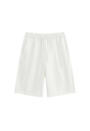 Short blanc longueur genou avec taille élastique, cordon de serrage et poches latérales, présenté sur un fond uni.