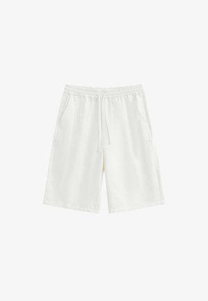 Short blanc longueur genou avec taille élastique, cordon de serrage et poches latérales, présenté sur un fond uni.