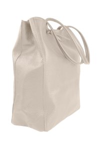 Grand sac fourre-tout en cuir beige avec une surface texturée, doté de poignées allongées et d'une forme spacieuse et structurée. Idéal pour transporter des objets.