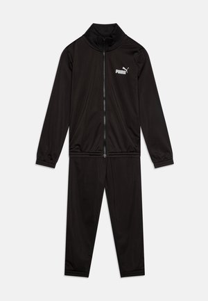 Fekete sportos tréningruha könnyű, sima anyagból. Magában foglal egy zipzáros kabátot magas nyakkal és rugalmas mandzsettákkal, valamint hozzá illő nadrágot.