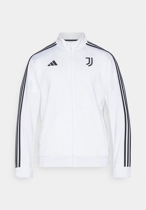 Valge suleteki spordijakk, millel on mustad triibud varrukatel, Adidas logo ja Juventus'i embleem rinnal. Sile kangas.