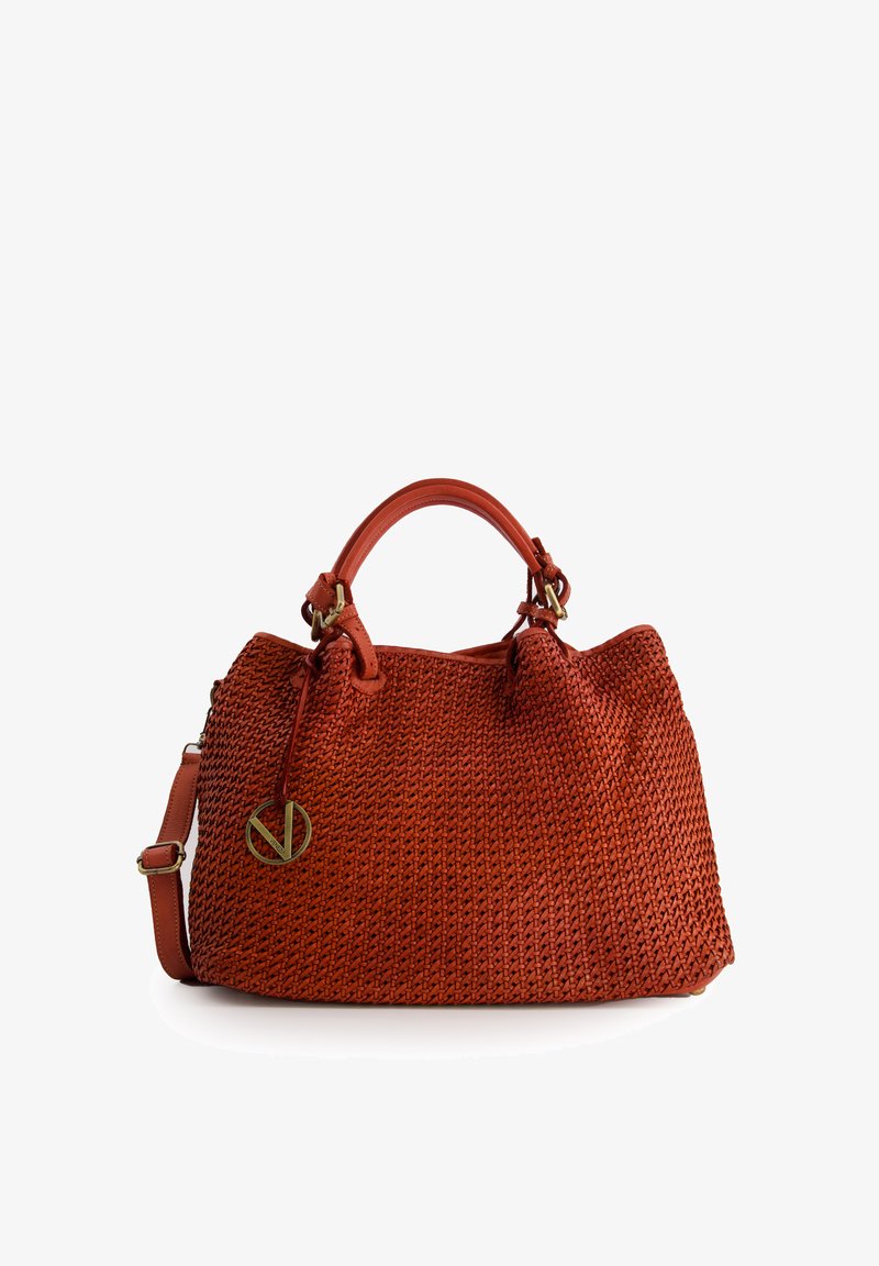 Woven red handbag with a textured surface, dual handles, and detachable shoulder strap. Includes gold-tone circular logo accent.