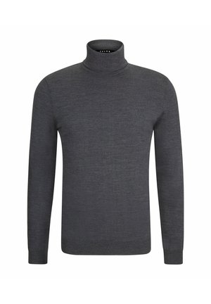 Pull en col roulé gris à manches longues, au design ajusté et à ourlet côtelé, associé à un pantalon noir fuselé et à des chaussures noires.