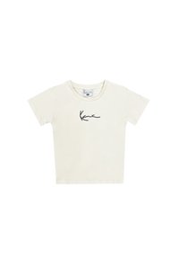 Kortärmad t-shirt med rundad hals i krämfärgad bomull, med en svart signaturdesign på framsidan. Slät textur, avslappnad passform.