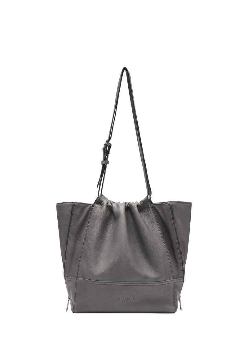 Graue Leder-Tote-Tasche mit einem gerafften Oberteil, zwei seitlichen Reißverschlüssen und einem verstellbaren Trageriemen, mit glatter Textur und definierten Nähten.