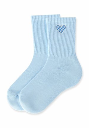 Light blue crew socks with ribbed cuffs and a small blue and white checkered heart patch near the top on one sock.