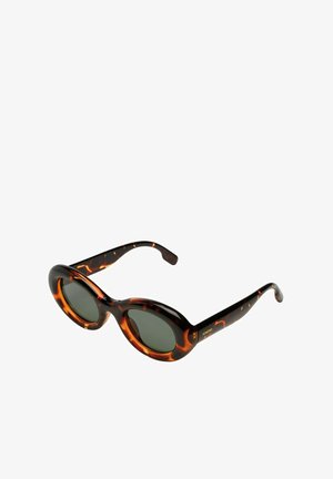 Gafas de sol de carey con lentes ovalados, detalles en negro y lentes gris oscuro. El patrón texturizado en la montura añade interés visual.
