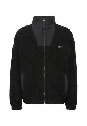 Black fleece jacket with a high collar, zip front, and contrasting smooth fabric accents on the shoulders and pockets. Textured surface.