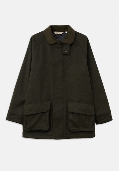 Dark green wool coat with a collared neck, two front pockets, and a button closure. Features a relaxed fit and soft texture.