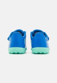 Blue athletic shoes with a textured upper, mint green outsole, and a heel tab. Features a logo in contrasting color on the side.