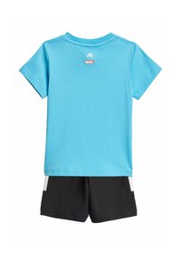 Blue cotton t-shirt with short sleeves and a round neck, featuring a white Adidas logo and red Marvel tag; paired with black shorts.