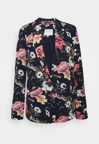 Námořnický květinový blejzr s květinovým vzorem v růžové, bílé a zelené barvě. Obsahuje klopový límec, dvě přední kapsy a zapínání na knoflíky.