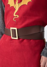 Brown leather belt with a rectangular gold buckle, worn over a red fabric with a dragon design and sparkly grey sleeves.