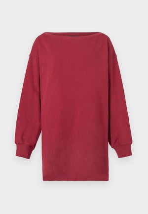 Μαρόν μακρυμάνικο πουκάμισο, φτιαγμένο από βαμβάκι, με ευρύ λαιμό σκάφους και άνετη εφαρμογή. Διαθέτει ριμπ μανσέτες και ίσια μύτη.