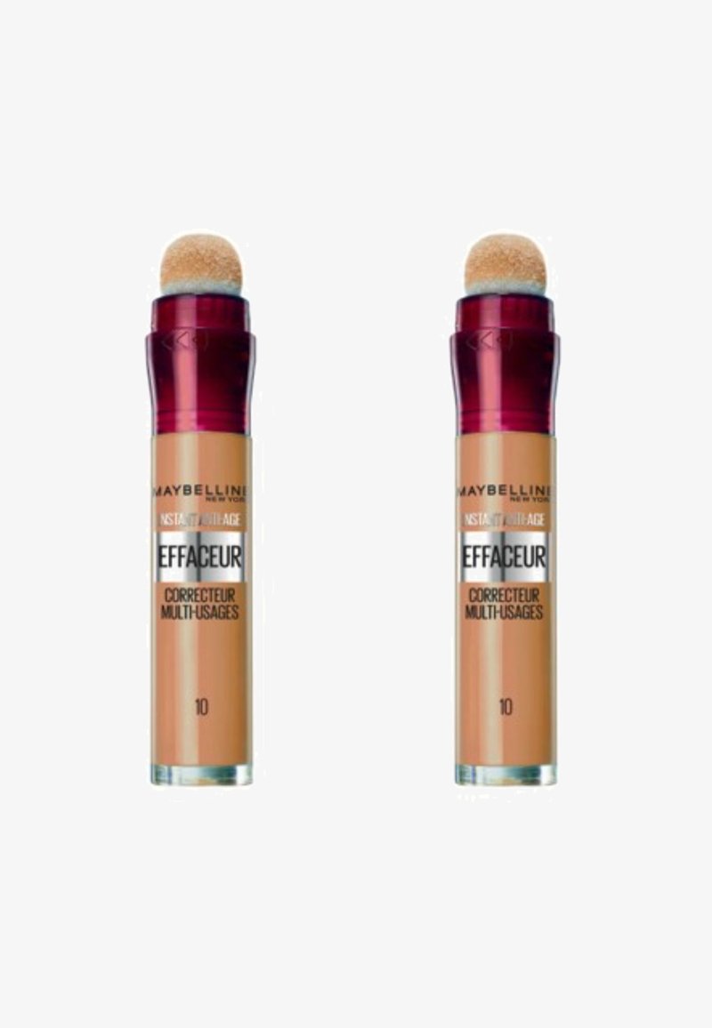 Deux tubes de correcteur beige avec des applicateurs en éponge arrondis, des bouchons bordeaux et des bases transparentes étiquetées "Effaceur" et "10".