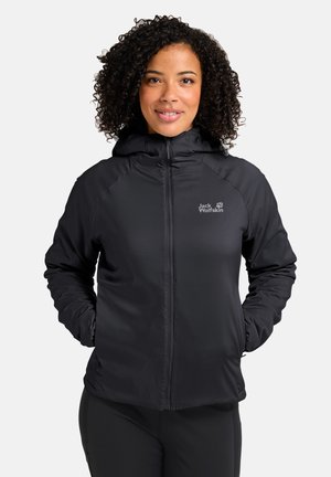 Black hooded jacket made from waterproof material, featuring a front zipper, side pockets, and the Jack Wolfskin logo on the chest.