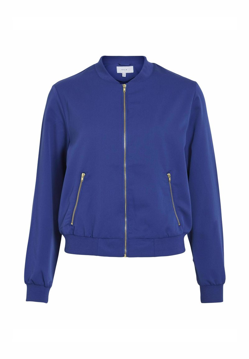 Niebieska kurtka bombka wykonana z gładkiego materiału, z złotym zamkiem błyskawicznym, ściągaczami na rękawach i okrągłym kołnierzem. Zawiera dwie boczne kieszenie zapinane na zamek.