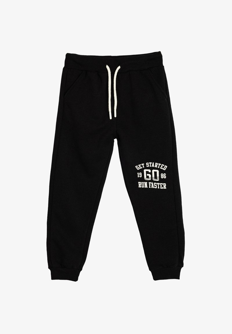 Black sweatpants with a drawstring waist, side pockets, and ribbed cuffs, featuring white text: “GET STARTED 1986 RUN FASTER.”