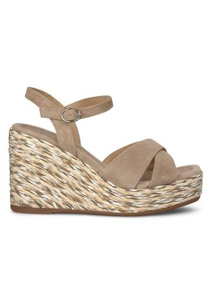 Beige suede wedge sandals with a crisscross strap design, featuring a braided jute heel and adjustable ankle strap with a silver buckle.