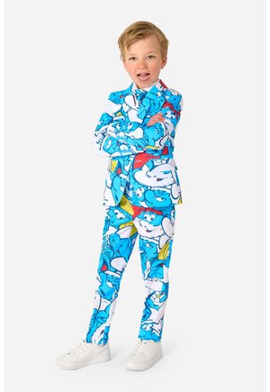 Completo colorato per bambini con uno sfondo blu e stampe di personaggi dei cartoni animati in bianco, rosso e giallo; include una giacca e pantaloni abbinati.