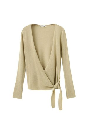 Jersey cruzado de punto acanalado beige con mangas largas y cierre con lazo en la cintura.