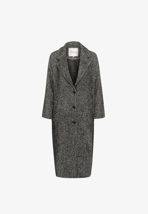 Manteau surdimensionné en chevron noir et blanc, avec un col cranté, une fermeture à boutons sur le devant et deux poches latérales.