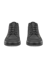 Black sneakers with a smooth synthetic upper, round toe, textured rubber sole, and contrasting white laces threaded through metal eyelets.